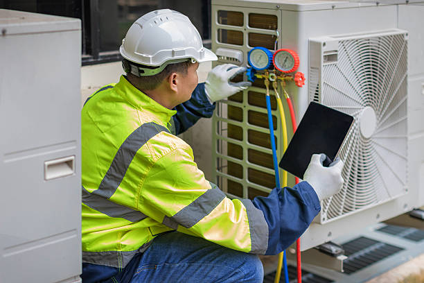 Professional Hvac technician working in Fletcher, OK